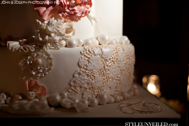 Wedding Cake Decorated with Pearls and Pink Flowers