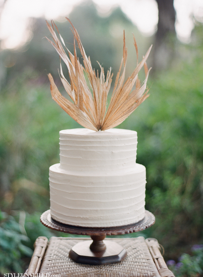 White Wedding Cake Topped with Fringed Leaf