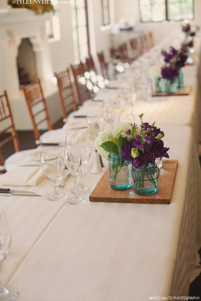 Rustic Table Decor with Mason Jars and Purple Flowers